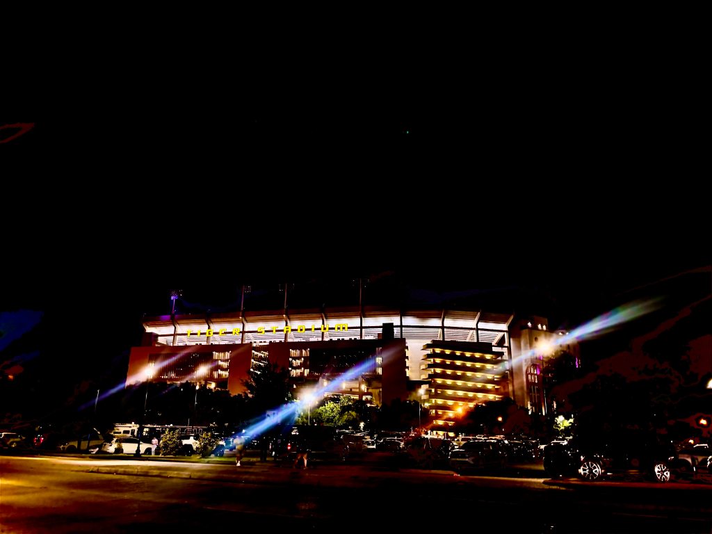The exterior of LSU's Tiger Stadium at night.